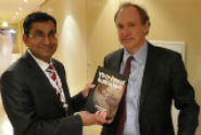 Badrul Khan presented his best-selling Web-Based Instruction book to Sir Tim Berners-Lee, the inventor of the Web.
